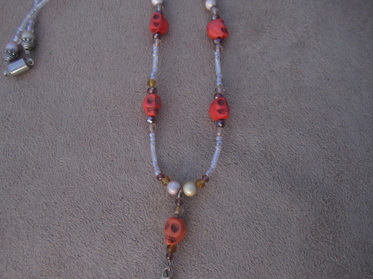 orange howlite dangle necklace picture