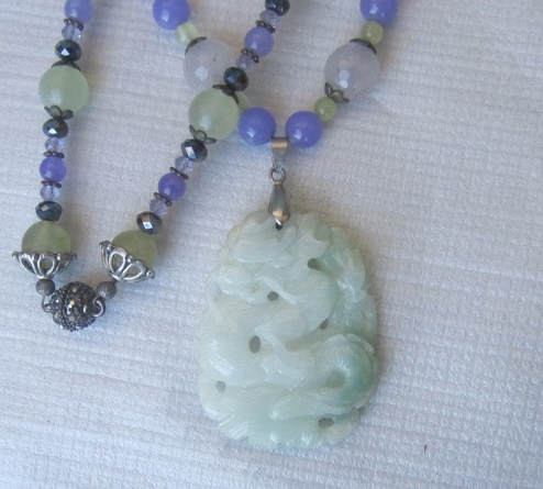 Carved jade pendant picture
